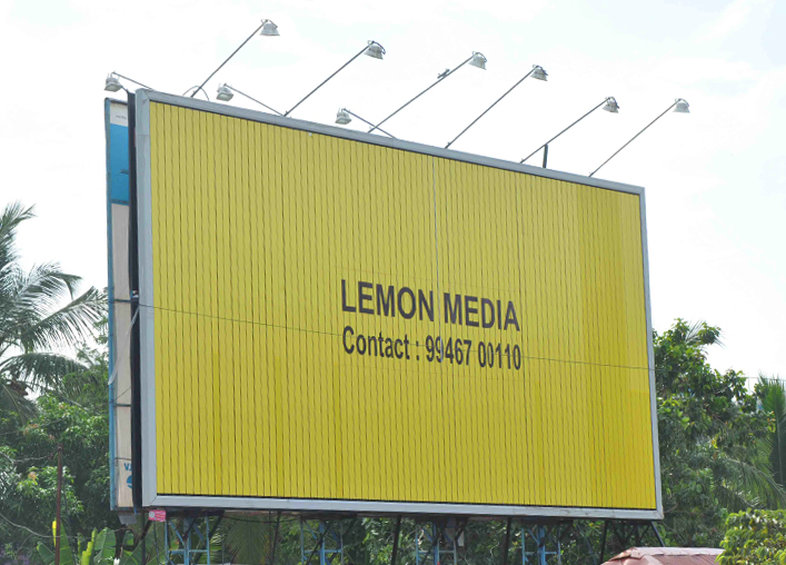 Billboard with yellow elements and BULL BLAK BAK BEOOM text