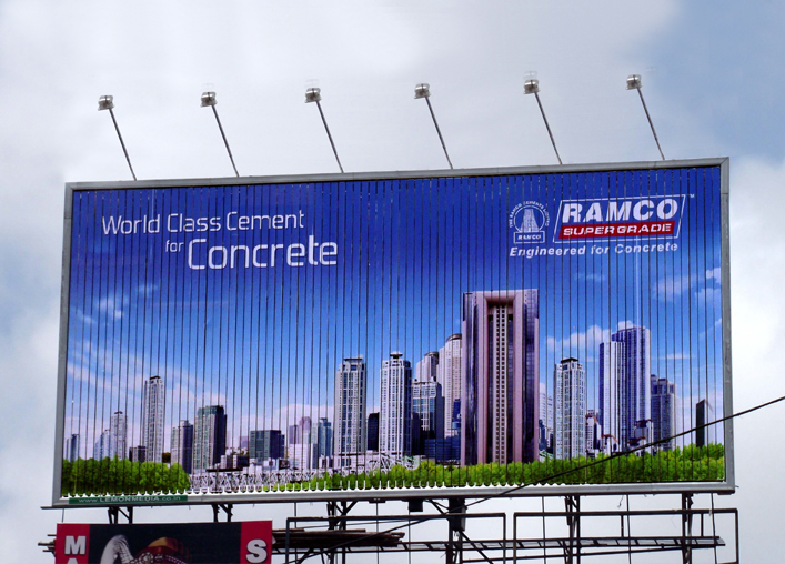 Black billboard with BOULONY MOIOKD text and product display